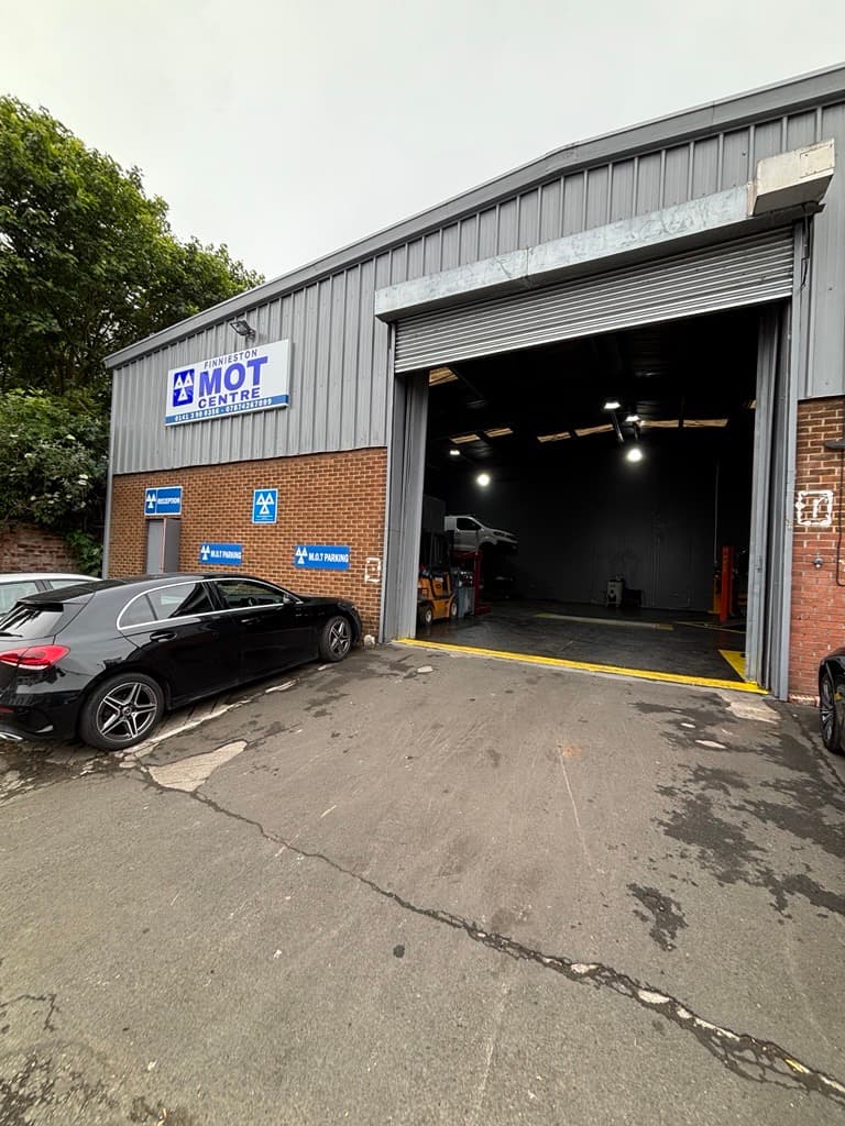 Mechanic working on a car